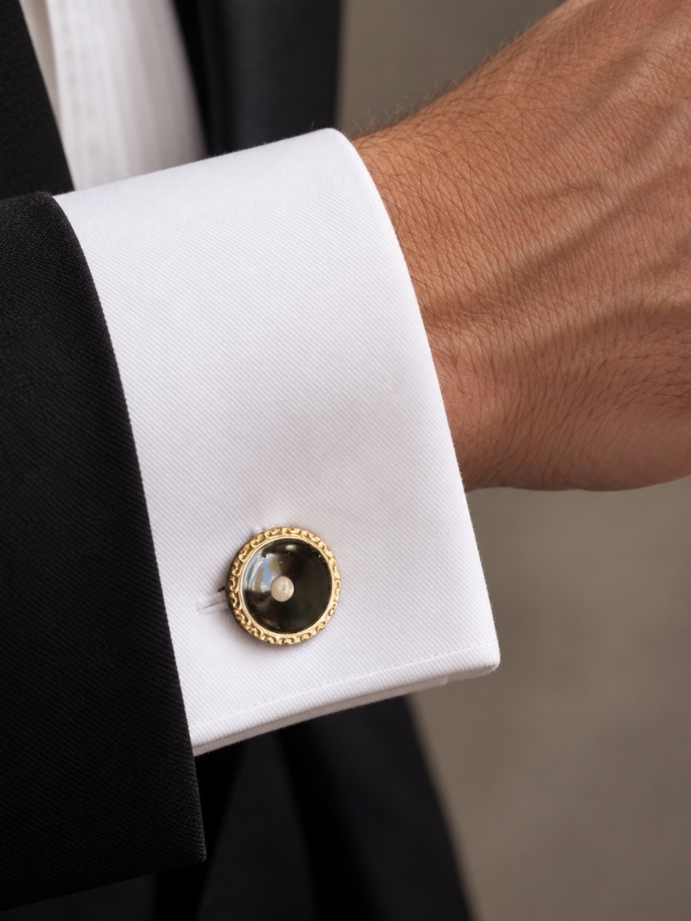 One B&W Kum-A-Part cufflink and one Park Roger Bros. Jiffy Link in a set
